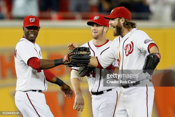 Roger Bernadina , Bryce Harper , and Jayson Werth of the Washington Nationals celebrate after the Nationals defeated the Los Angeles Dodgers 4-1 to...