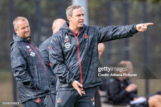 Michael Duff Manager of Swansea City gives the players instructions during a pre-season friendly match between Swansea City and Brondby IF at the...