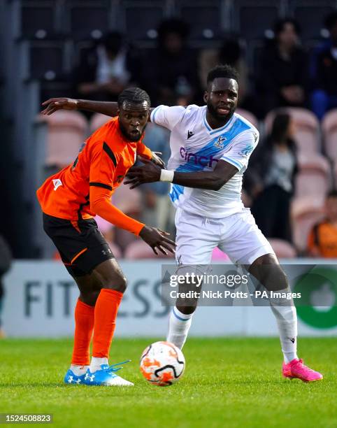 Crystal Palace's Odsonne Edouard and Barnet's Dominic Revan battle for the ball during a friendly match at The Hive Stadium, London. Picture date:...
