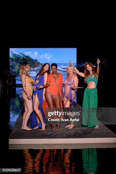 Samantha Hoopes, Carol Alt, Roshumba, Vendela Kirsebom and Elsa Benitez walk the Sports Illustrated Swimsuit Show's runway during the Miami Swim Week...