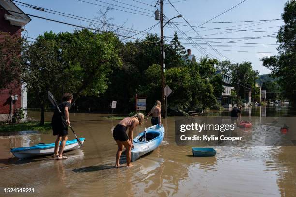 At the northern start of flooding on Elm Street, many people brought out their kayaks on July 11, 2023 in Montpelier, Vermont. Up to eight inches of...