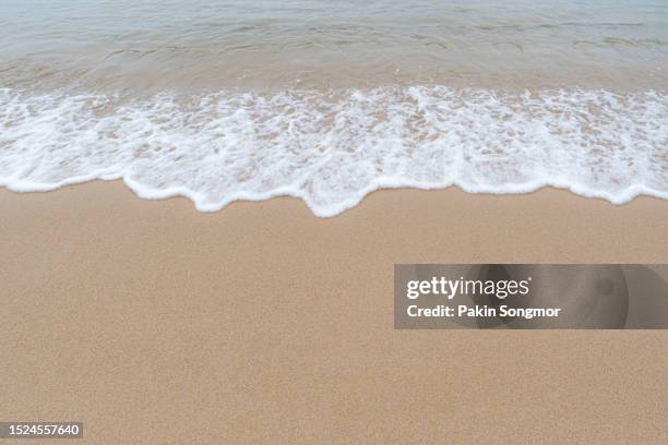 ocean wave with reflection on wet sand. - australia summer reflection foto e immagini stock