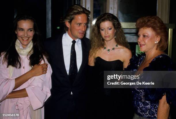 French actress Carole Bouquet, Michael Douglas, his wife Diandra Douglas and guest in Trouville, France on August 10, 1985.