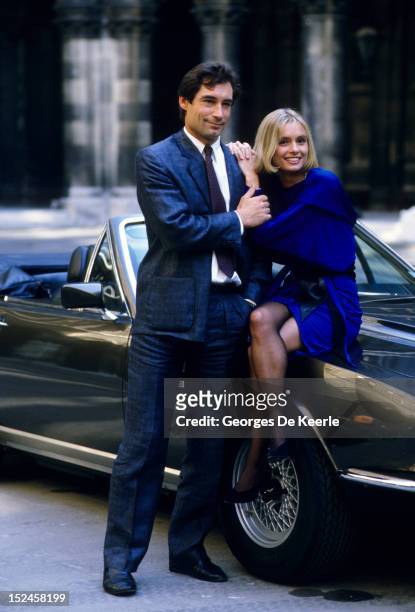 Welsh actor Timothy Dalton with his co-star Maryam D'Abo during production of the James Bond film 'The Living Daylights' on location in Austria on...