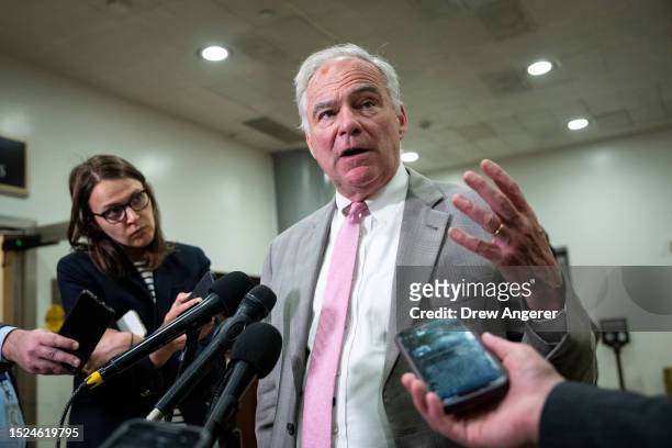 Sen. Tim Kaine speaks to reporters on his way to a classified all-Senate briefing on Artificial Intelligence at the U.S. Capitol on July 11, 2023 in...