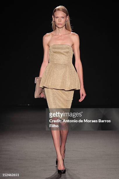 Model walks the runway during the Les Copains show as a part of Milan Fashion Week Womenswear S/S 2013 on September 21, 2012 in Milan, Italy.