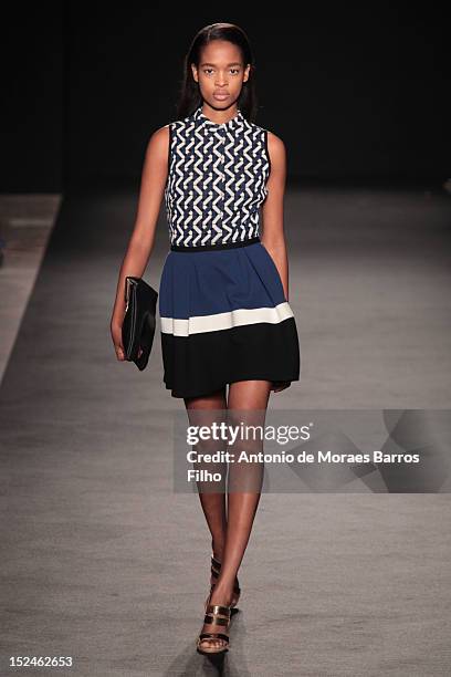 Model walks the runway during the Les Copains show as a part of Milan Fashion Week Womenswear S/S 2013 on September 21, 2012 in Milan, Italy.