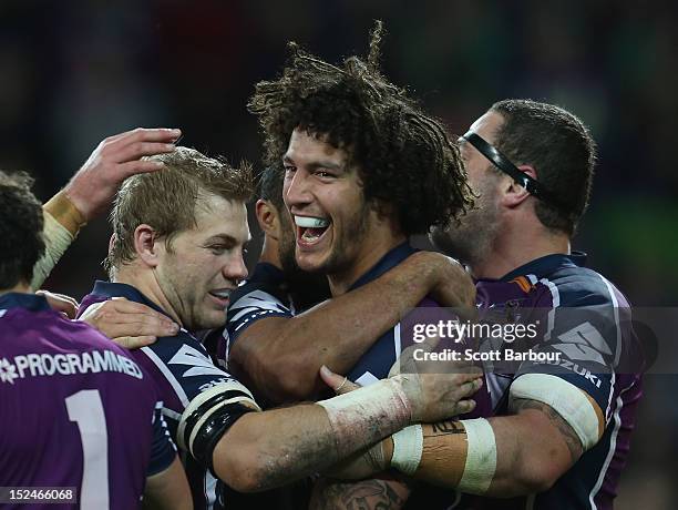 Kevin Proctor of the Storm celebrates after scoring a try in the second half during the NRL Preliminary Final match between the Melbourne Storm and...