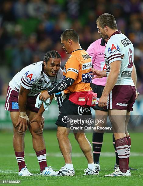 Steve Matai of the Sea Eagles is attended to by a trainer during the NRL Preliminary Final match between the Melbourne Storm and the Manly Sea Eagles...