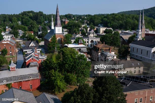 Water floods multiple downtown streets on July 11, 2023 in Montpelier, Vermont. Up to eight inches of rain fell over 48 hours and residents were...