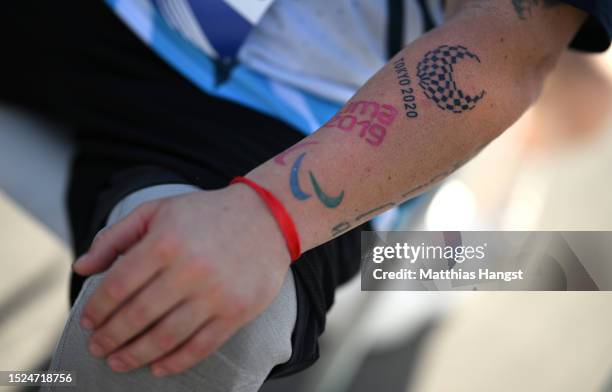 Detailed view of a Tokyo 2020 tattoo is seen on the arm of PD Reinoso Gimenez of Argentina during day one of the Paris 2023 Para Athletics World...