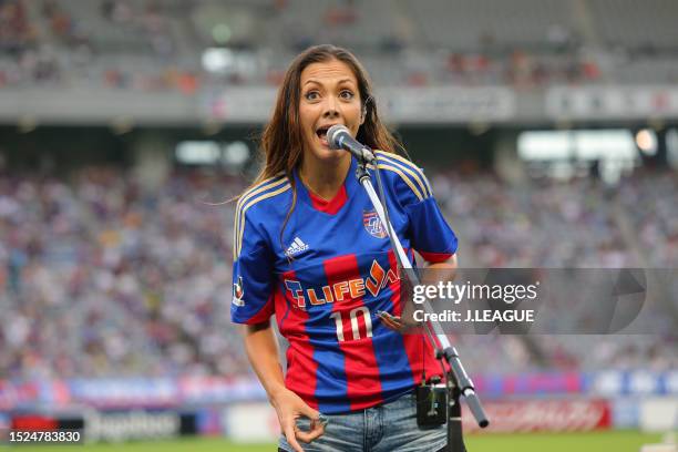 Singer and model Anna Tsuchiya performs prior to the J.League J1 match between FC Tokyo and Shimizu S-Pulse at Ajinomoto Stadium on August 2, 2014 in...