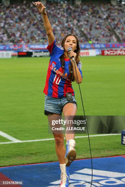 Singer and model Anna Tsuchiya performs prior to the J.League J1 match between FC Tokyo and Shimizu S-Pulse at Ajinomoto Stadium on August 2, 2014 in...