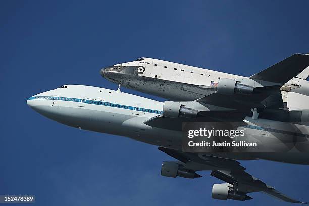 The Space Shuttle Endavour flies on top of a modified 747 jumbo jet en route to Los Angeles on September 21, 2012 in Sausalito, California. The Space...