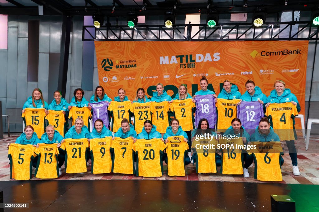The Australian Matildas squad pose for photos with their...