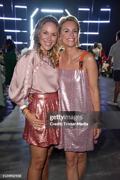 Kathi Woerndl and Sandra Kuhn attend the Marcel Ostertag fashion show at W.E4. Fashion Day as part of Berlin Fashion Week SS24 at Verti Music Hall on...