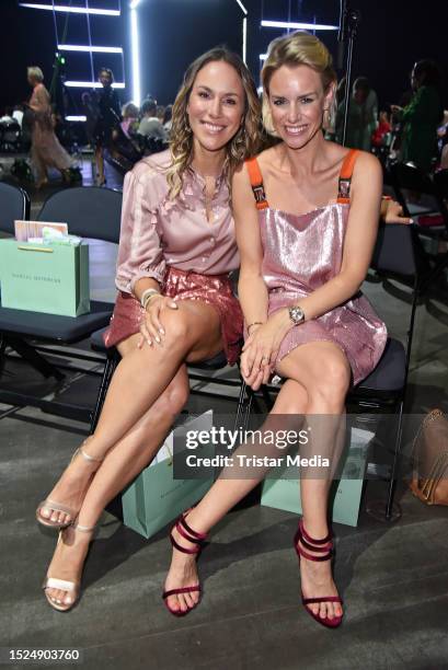 Kathi Woerndl and Sandra Kuhn attend the Marcel Ostertag fashion show at W.E4. Fashion Day as part of Berlin Fashion Week SS24 at Verti Music Hall on...