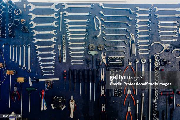 view of a set of tools in a car repair shop. - workbench stock pictures, royalty-free photos & images
