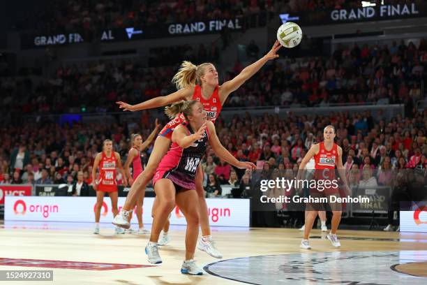 Maddy Turner of the Swifts competes for the ball against Georgie Horjus of the Thunderbirds during the 2023 Super Netball Grand Final match between...