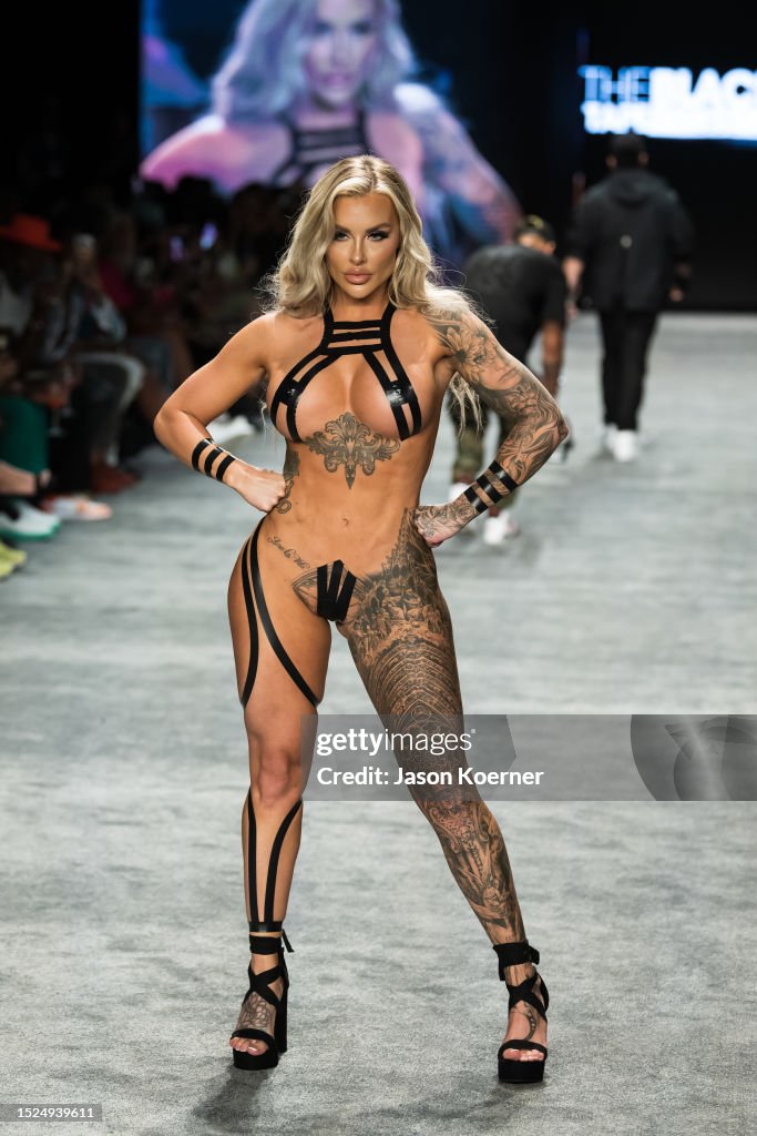 A model walks the runway wearing Black Tape Project during Miami Swim