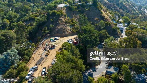 Los Angeles, CA New construction of homes is ongoing in the Hollywood Hills, where a critical wildlife corridor connecting Laurel and Nichols canyons...