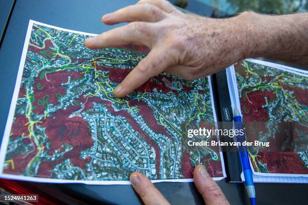 Los Angeles, CA Paul Edelman, Deputy Director of Natural Resources and Planning at Santa Monica Mountains Conservancy points out a map outlining...