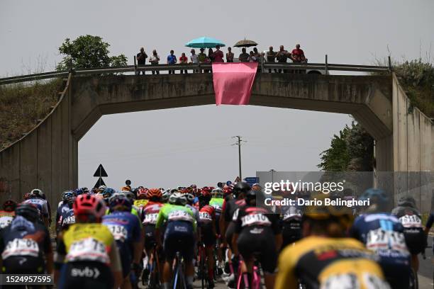 General view of the peloton competing while fans cheer during the 34th Giro d'Italia Donne 2023, Stage 8 a 125.7km stage from Nuoro to Sassari /...