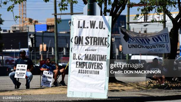 Striking International Longshore and Warehouse Union workers picket in front of the BC Maritime Employees Association Despatch Centre in Vancouver,...