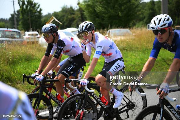 Tadej Pogacar of Slovenia and UAE Team Emirates - White Best Young Rider Jersey rides whilst eating during the stage eight of the 110th Tour de...