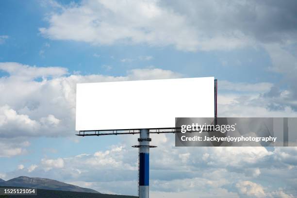 blank advertising screen against soft blue sky - outdoor banner sign stock pictures, royalty-free photos & images