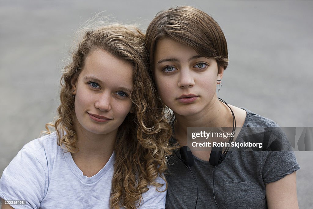 Two girls looking into camera