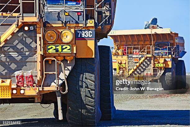 trucks at kalgoorlie super pit gold mine - banagan dumper truck stock pictures, royalty-free photos & images
