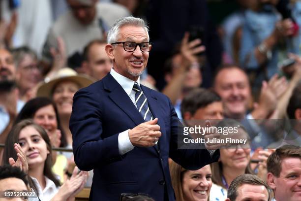 Sports broadcaster and former professional footballer Gary Lineker reacts in the Royal Box prior to the Men's Singles third round match between...