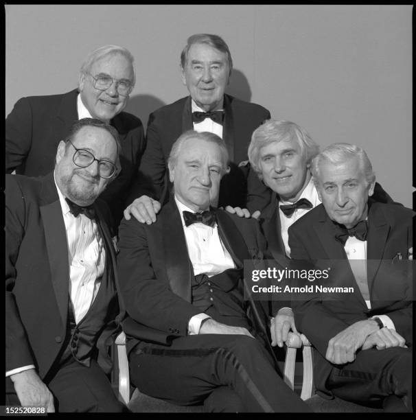 Group portrait at a dinner party for American magazine editor Frank Zachary , January 7, 1992. Photographer Arnold Newman is seated at front left.