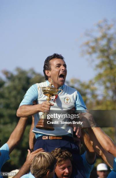 The European Captain Tony Jacklin celebrates with the trophy after victory in the Ryder Cup at Muirfield Village in Ohio, USA. Europe won the event...