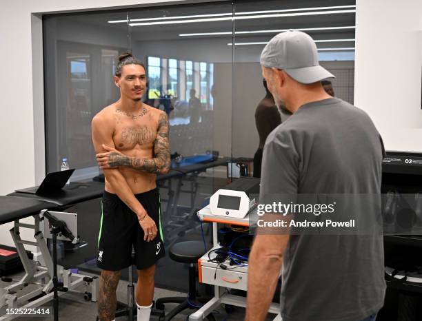 Jurgen Klopp manager of Liverpool talking with Darwin Nunez of Liverpool during the first day back for pre-season at AXA Training Centre on July 08,...