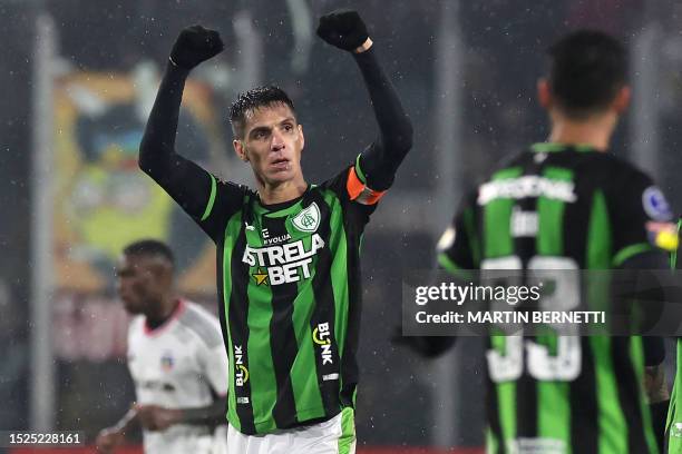 America MG's midfielder Ale celebrates after scoring during the Copa Sudamericana round of 32 knockout play-offs first leg football match between...