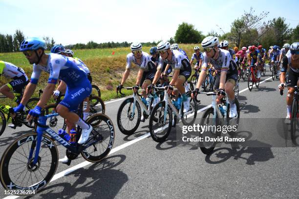 Phil Bauhaus of Germany, Nikias Arndt of Germany and Fred Wright of United Kingdom and Team Bahrain Victorious compete during the stage eight of the...