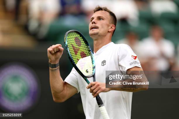 Marton Fucsovics of Hungary celebrates against Daniil Medvedev in the Men's Singles third round match during day six of The Championships Wimbledon...