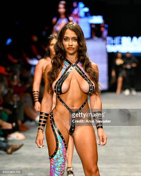 Celina Smith walks the runway wearing Black Tape Project during Miami Swim Week Powered by Art Hearts Fashion at Fontainebleau Hotel on July 07, 2023...