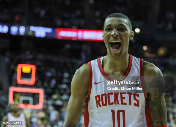 Jabari Smith Jr. #10 of the Houston Rockets celebrates after hitting a game-winning 3-pointer against the Portland Trail Blazers with under a second...