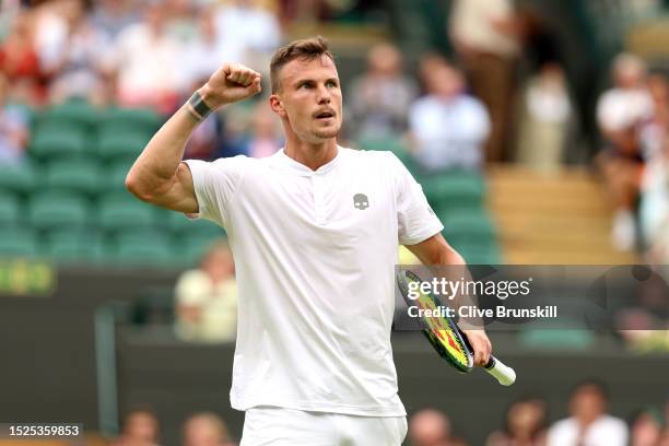 Marton Fucsovics of Hungary celebrates against Daniil Medvedev in the Men's Singles third round match during day six of The Championships Wimbledon...