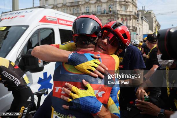 Stage winner Mads Pedersen of Denmark and Jasper Stuyven of Belgium and Team Lidl-Trek react after the stage eight of the 110th Tour de France 2023 a...