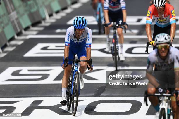 Simon Yates of United Kingdom and Team Jayco-AlUla crosses the finish line after being involved in a crash during the stage eight of the 110th Tour...