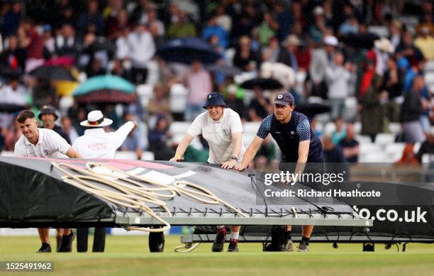 Groundstaff bring on the cover as rain delays interrupts play during Day Three of the LV= Insurance Ashes 3rd Test Match between England and...