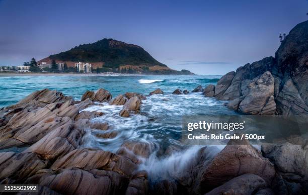 scenic view of sea against sky,mount maunganui,tauranga,new zealand - tauranga stock pictures, royalty-free photos & images