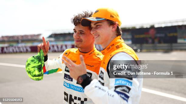 Second placed qualifier Lando Norris of Great Britain and McLaren and Third placed qualifier Oscar Piastri of Australia and McLaren celebrates in...