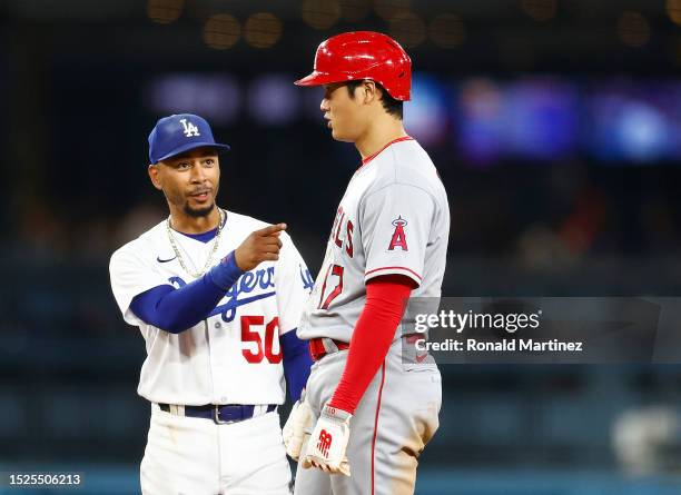 Mookie Betts of the Los Angeles Dodgers and Shohei Ohtani of the Los Angeles Angels in the fourth inning at Dodger Stadium on July 07, 2023 in Los...