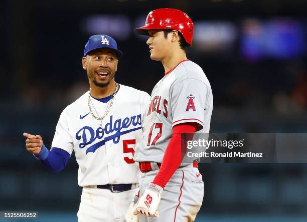 Mookie Betts of the Los Angeles Dodgers and Shohei Ohtani of the Los Angeles Angels in the fourth inning at Dodger Stadium on July 07, 2023 in Los...