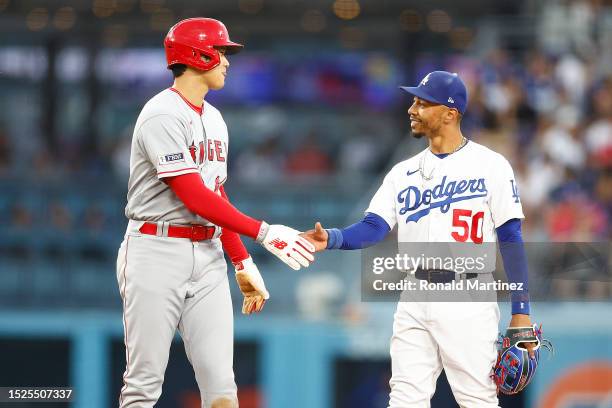 Mookie Betts of the Los Angeles Dodgers and Shohei Ohtani of the Los Angeles Angels in the fourth inning at Dodger Stadium on July 07, 2023 in Los...